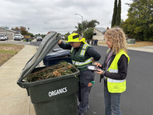 Livermore Recycles outreach team checking green carts on the street